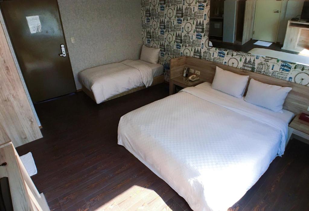 Postel nebo postele na pokoji v ubytování Love Hotel