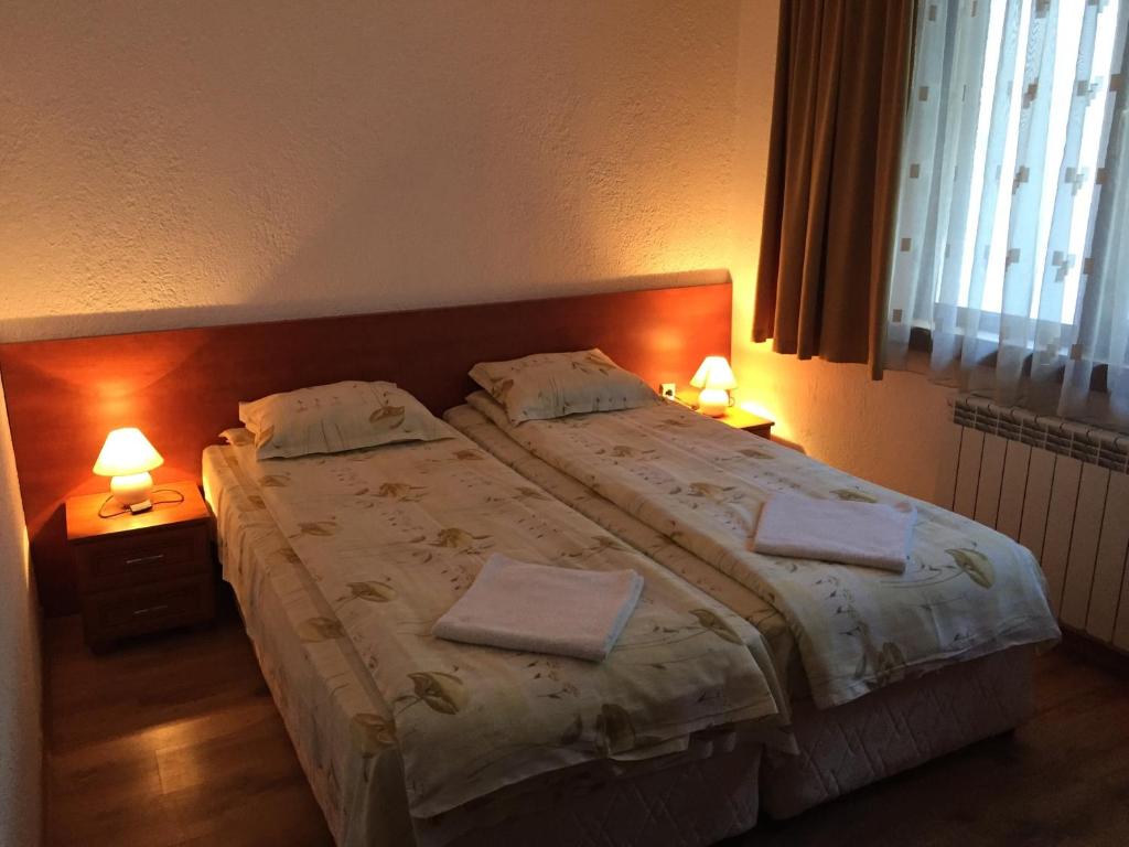 Postel nebo postele na pokoji v ubytování Guest Rooms Vachin