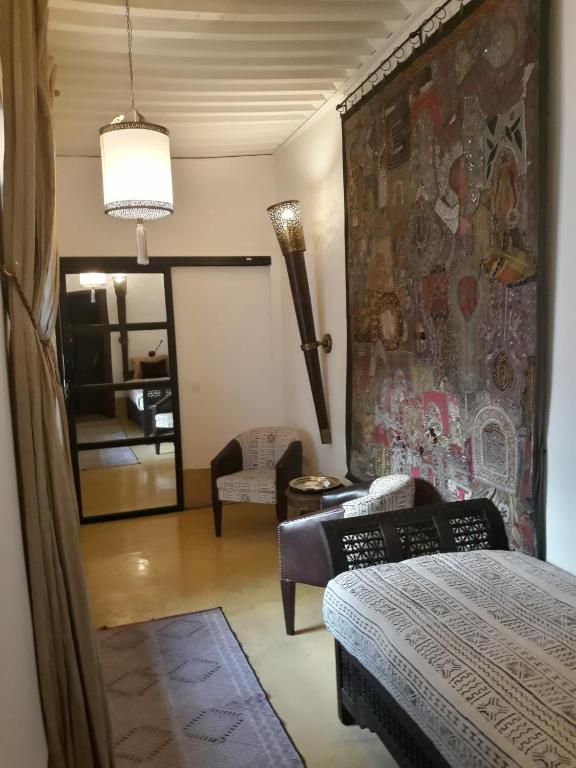 Postel nebo postele na pokoji v ubytování Riad Dar Oulhoum
