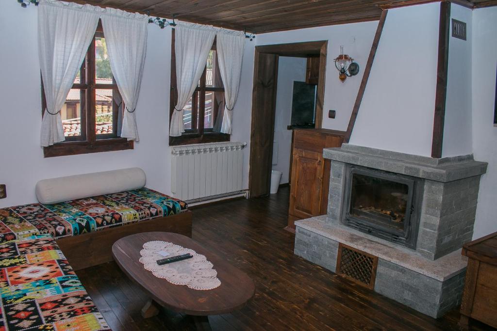 Postel nebo postele na pokoji v ubytování ЧОЛАКОВАТА КЪЩА