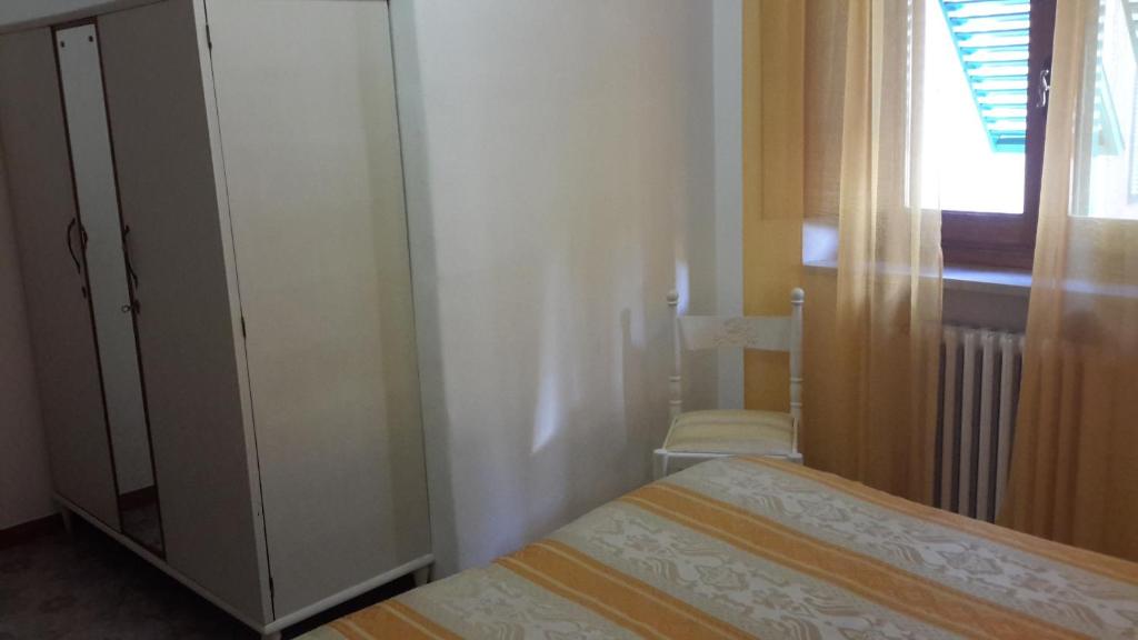 Postel nebo postele na pokoji v ubytování Verena Dependance Savoia & Campana