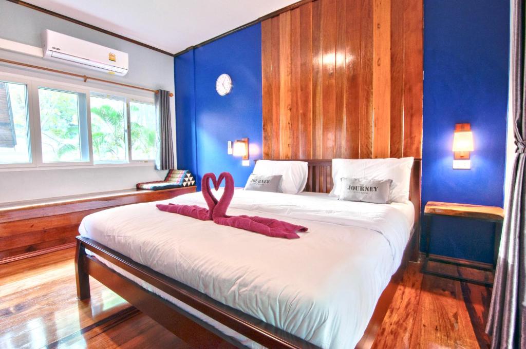 Postel nebo postele na pokoji v ubytování Rapala Rock Wood Resort- SHA Plus