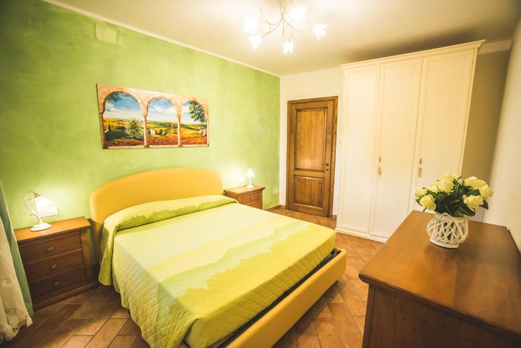 Postel nebo postele na pokoji v ubytování ATENA