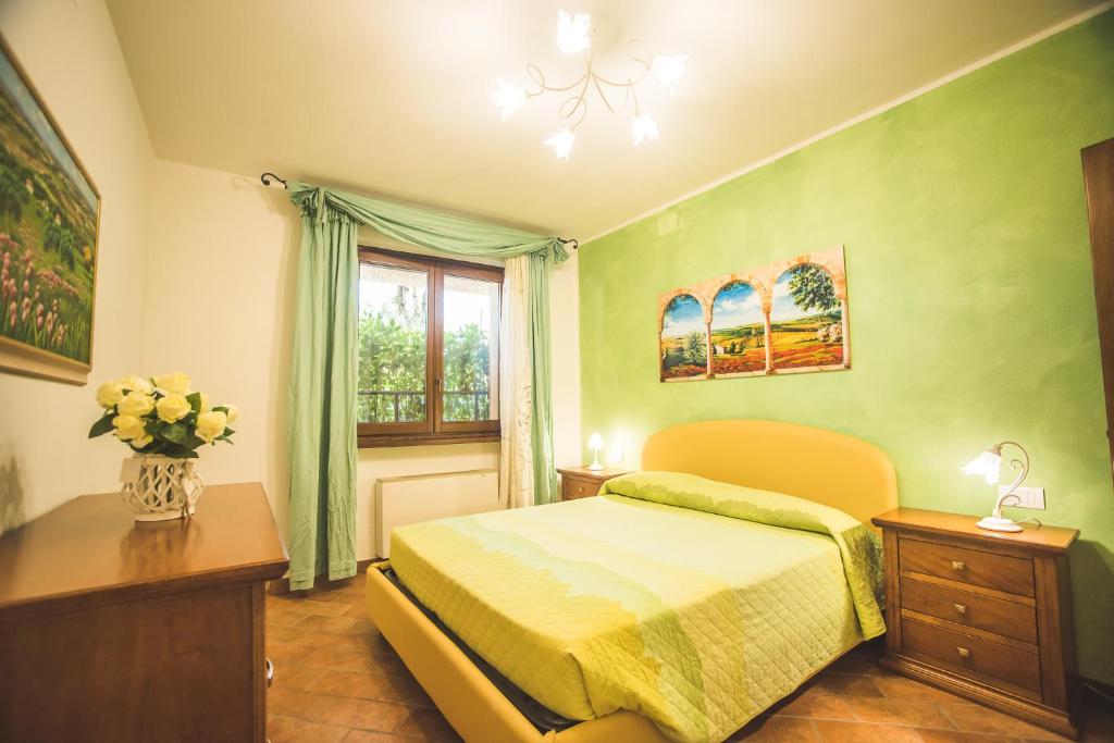 Postel nebo postele na pokoji v ubytování ATENA