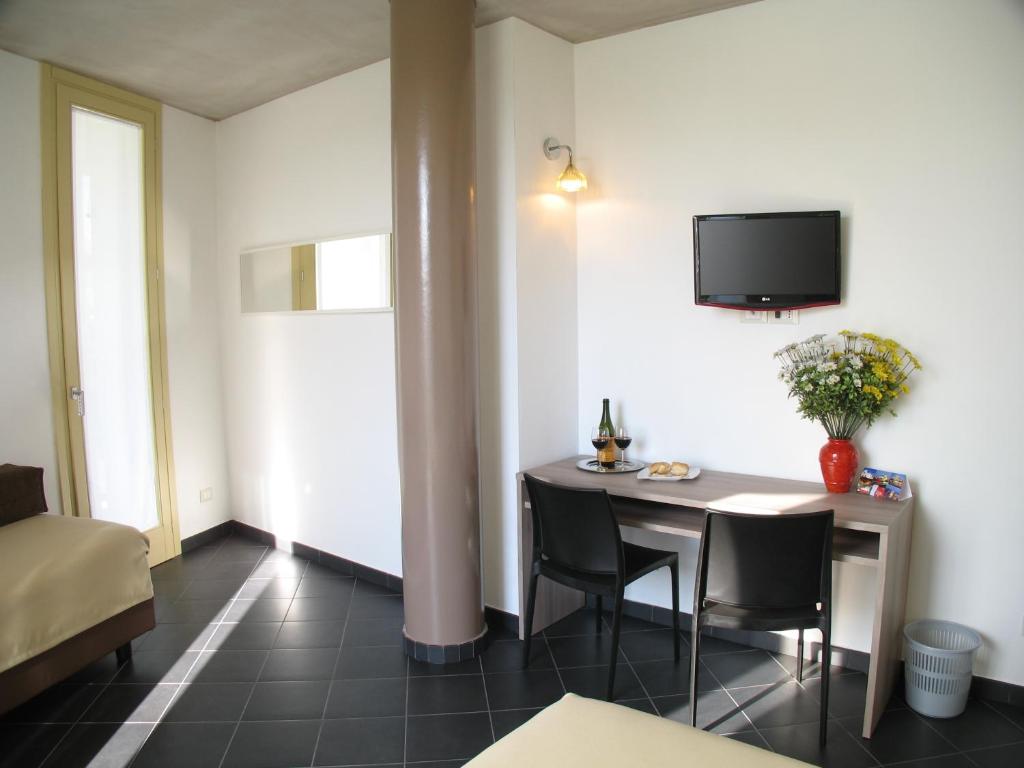 TV a/nebo společenská místnost v ubytování 6 Porte Guesthouse