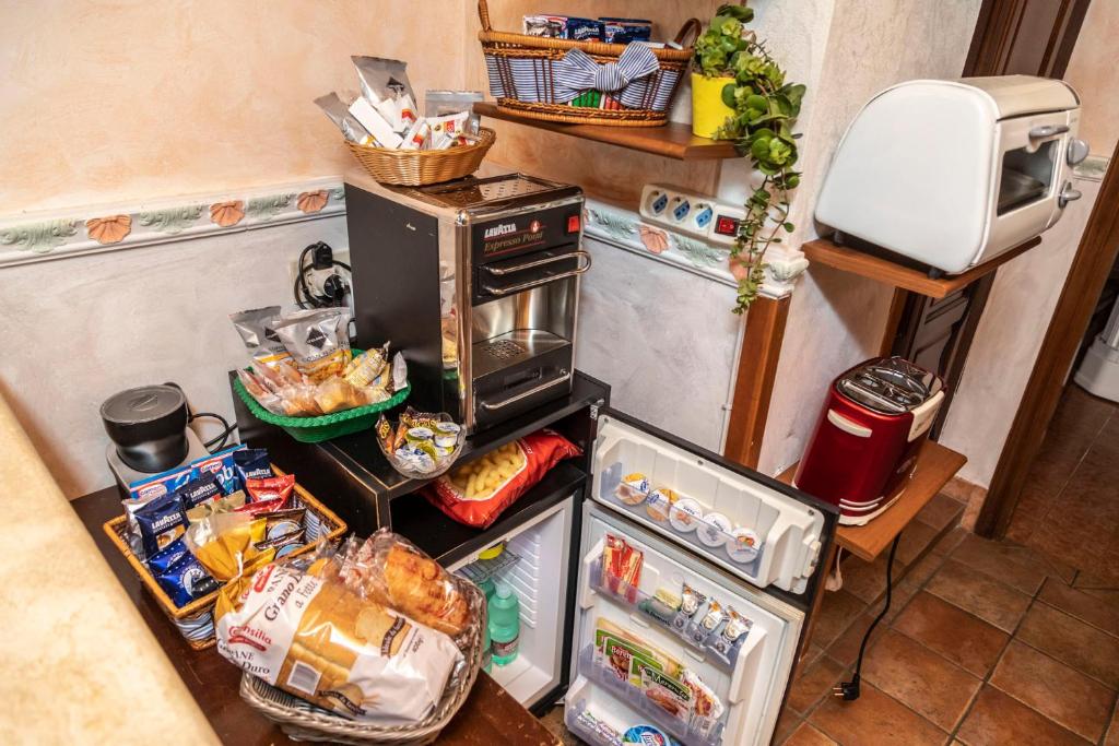 Kuchyň nebo kuchyňský kout v ubytování Hotel Barrett