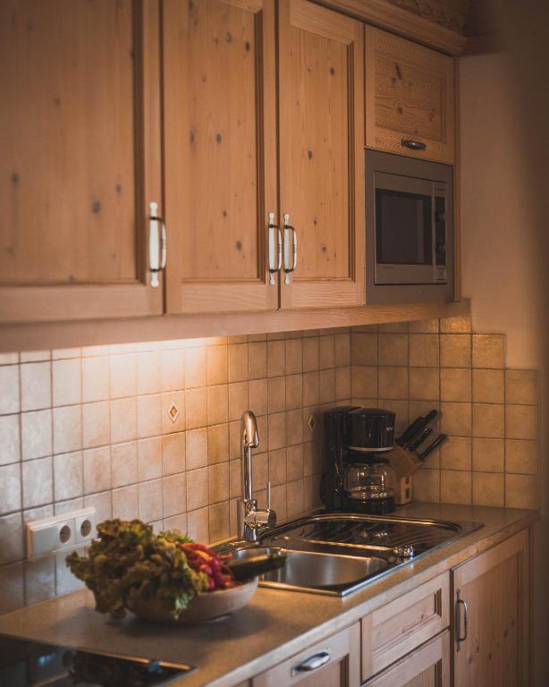 Kuchyň nebo kuchyňský kout v ubytování Apartments Pitschlmann
