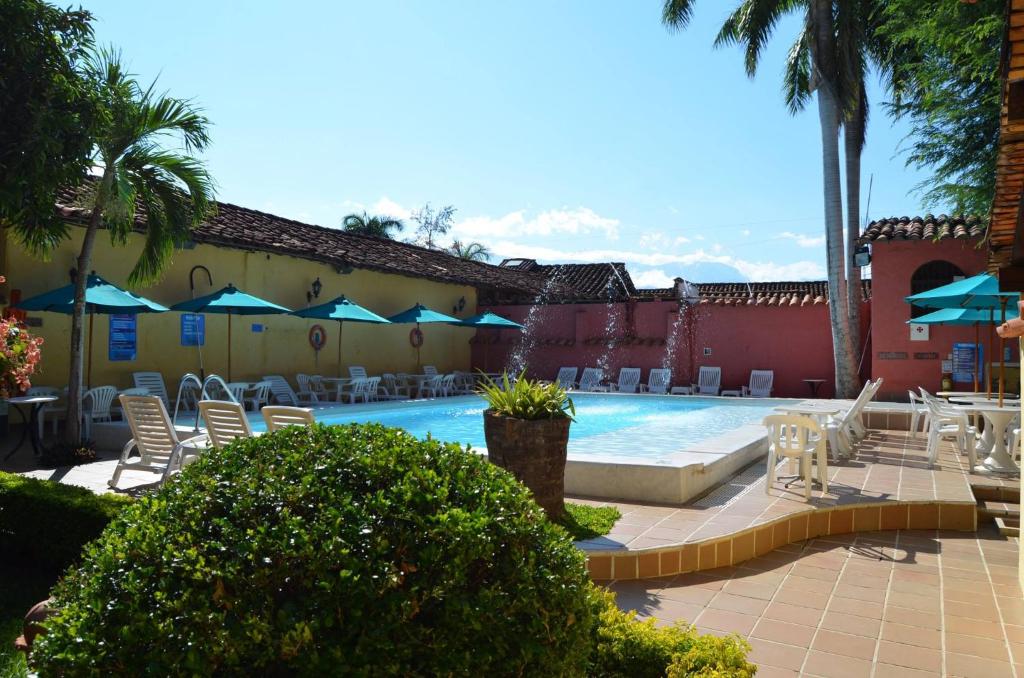 Bazén v ubytování Casa Hotel Guaracú nebo v jeho okolí