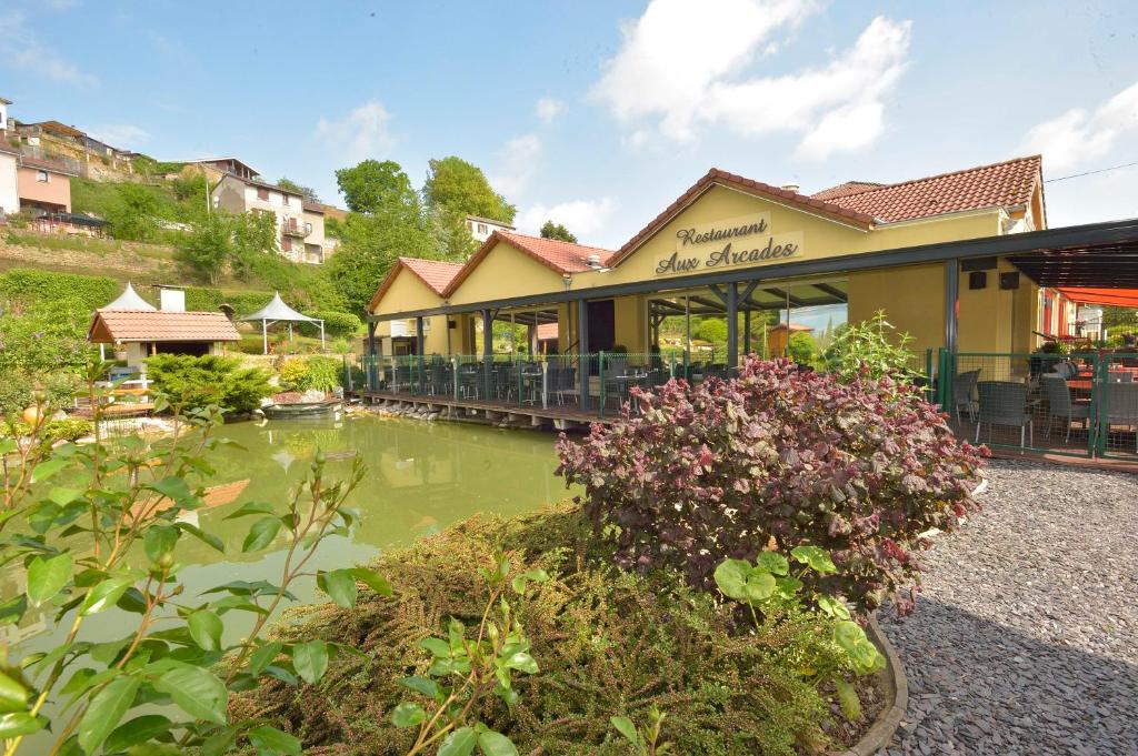Zahrada ubytování Hôtel Aster Restaurant Aux Arcades