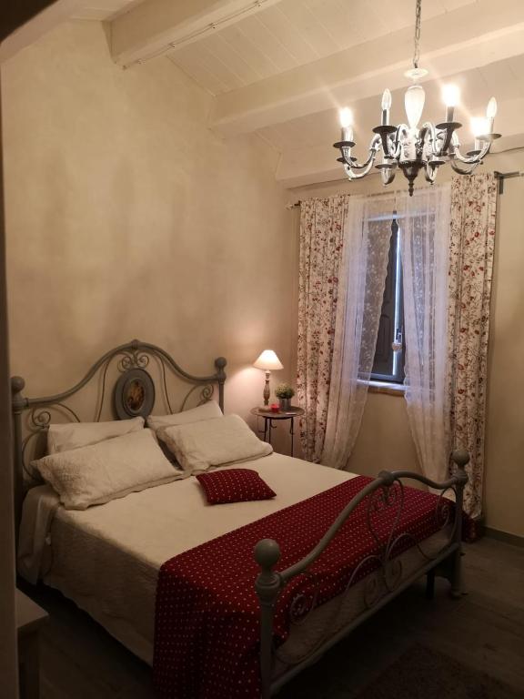 Postel nebo postele na pokoji v ubytování B&B Col di Piagge