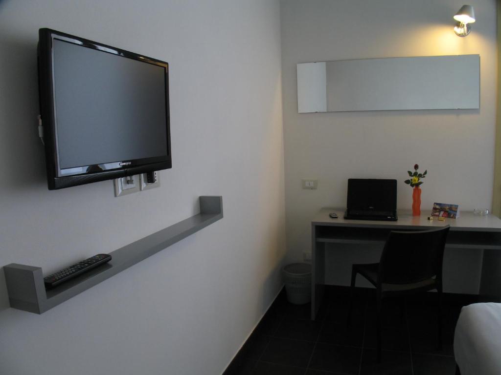 TV a/nebo společenská místnost v ubytování 6 Porte Guesthouse