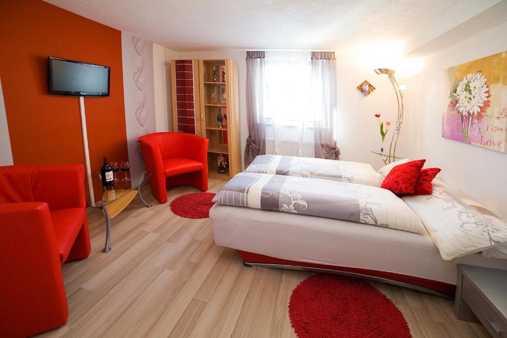 TV a/nebo společenská místnost v ubytování Pension Kuhn
