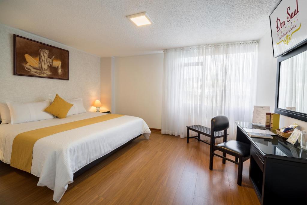 Postel nebo postele na pokoji v ubytování Hotel Don Saul