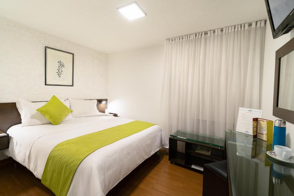 Postel nebo postele na pokoji v ubytování Hotel Don Saul