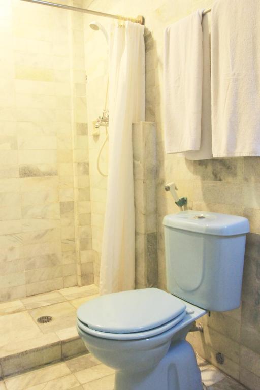 Koupelna v ubytování Hotel Karthi Kuta