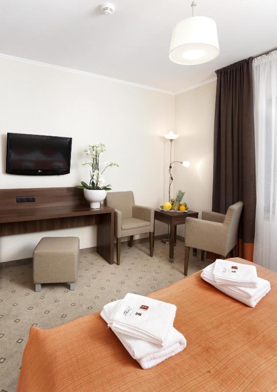 TV a/nebo společenská místnost v ubytování Artus Resort