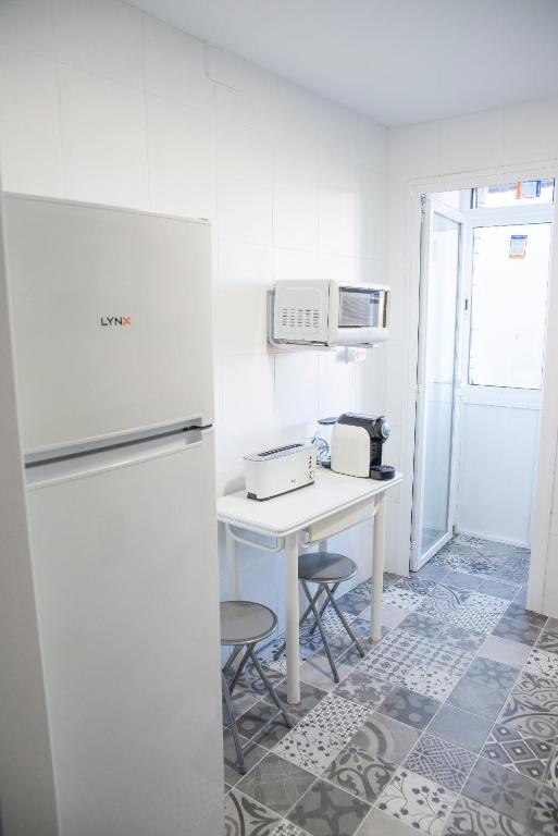 Kuchyň nebo kuchyňský kout v ubytování Apartamento Plaza Mayor Cáceres