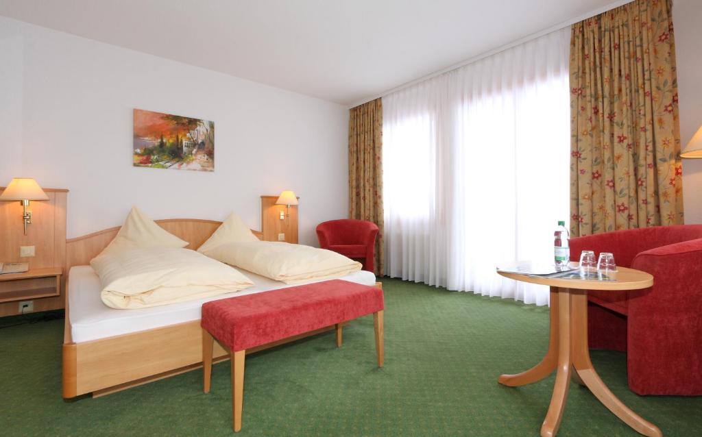 Voodi või voodid majutusasutuse Bernerhof Swiss Quality Hotel toas
