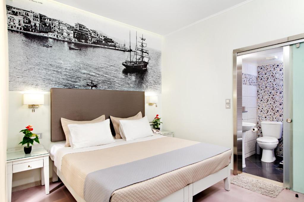 Postel nebo postele na pokoji v ubytování Hotel Ideon