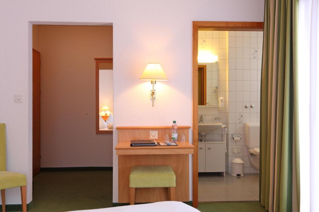 Voodi või voodid majutusasutuse Bernerhof Swiss Quality Hotel toas