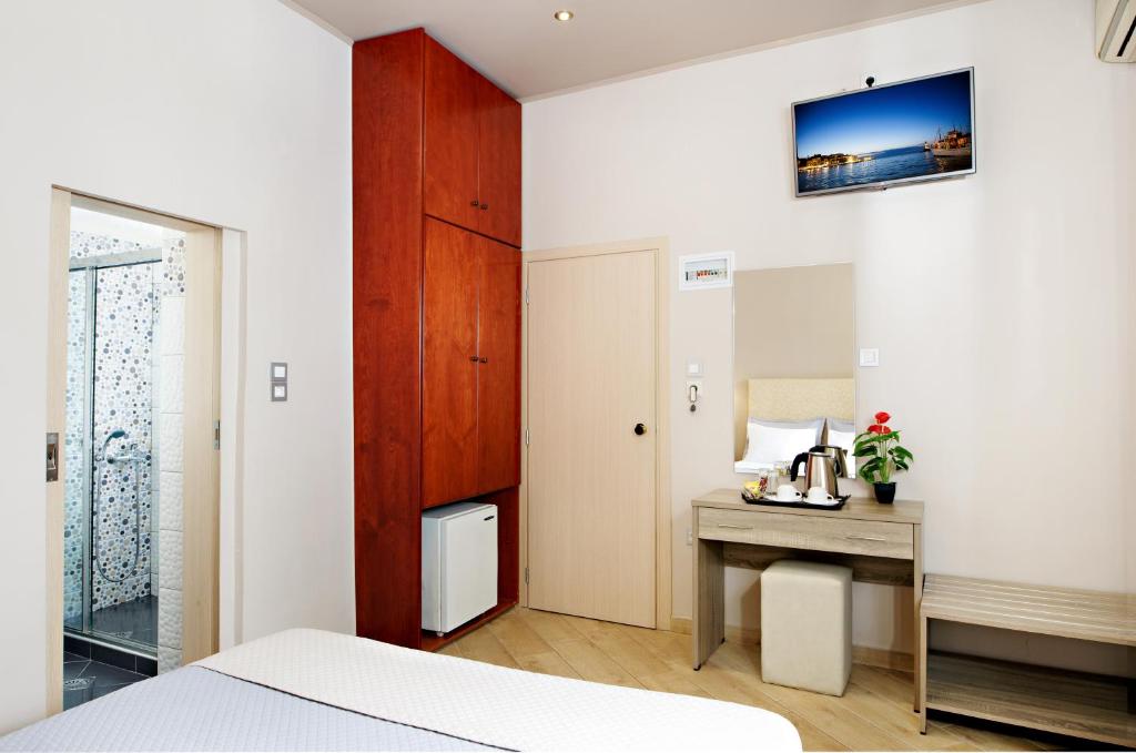 Postel nebo postele na pokoji v ubytování Hotel Ideon