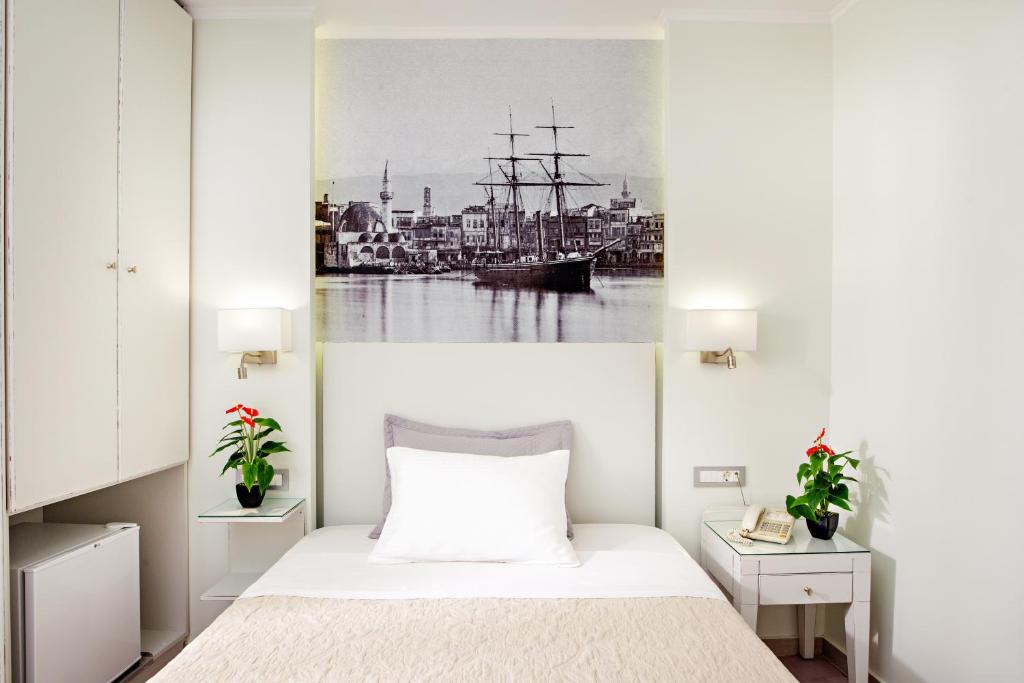 Postel nebo postele na pokoji v ubytování Hotel Ideon