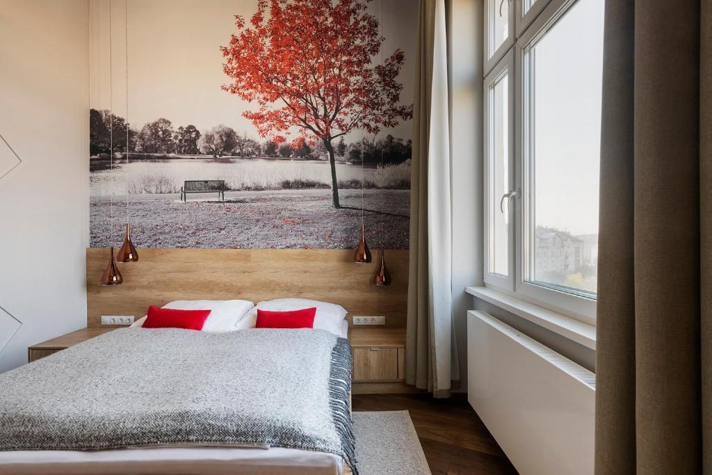Posteľ alebo postele v izbe v ubytovaní Lakeside Budapest Residences
