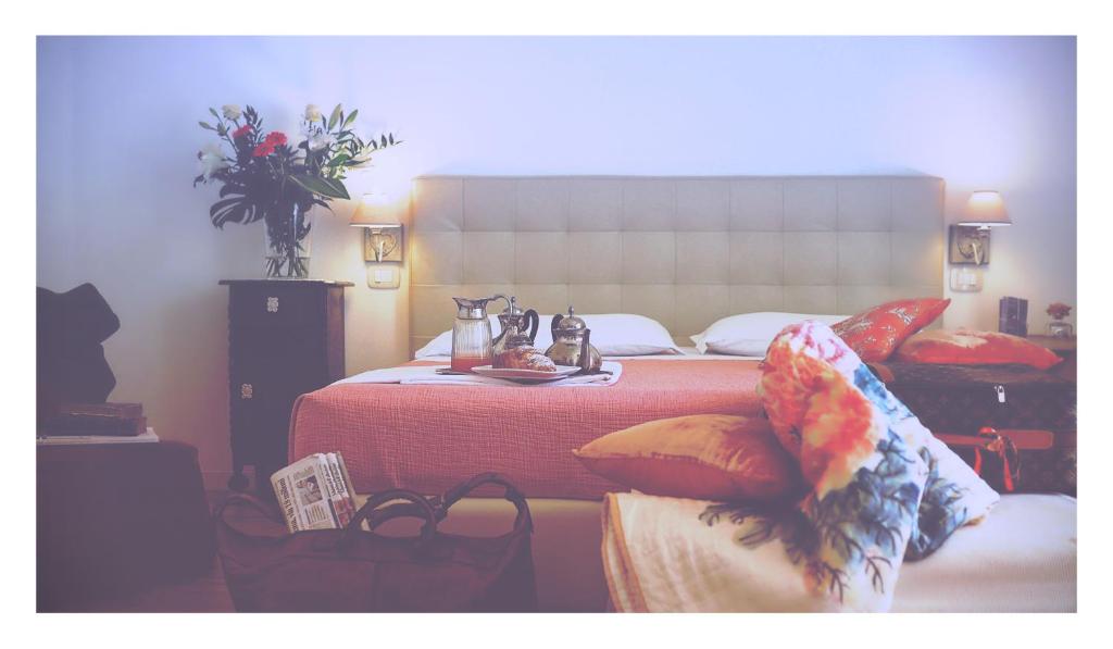 Postel nebo postele na pokoji v ubytování B&B Dolce Olga