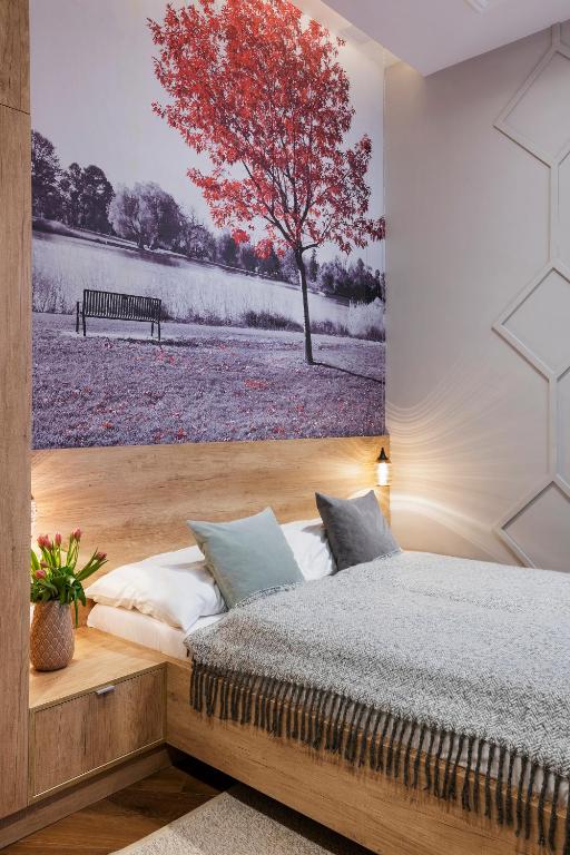 Posteľ alebo postele v izbe v ubytovaní Lakeside Budapest Residences