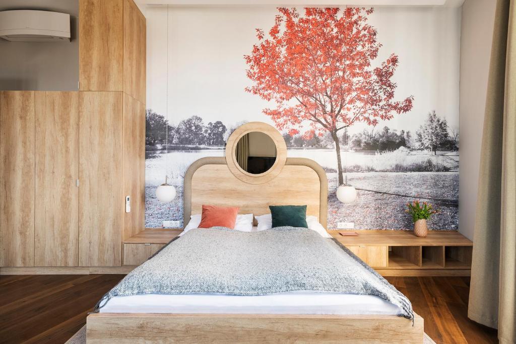 Posteľ alebo postele v izbe v ubytovaní Lakeside Budapest Residences