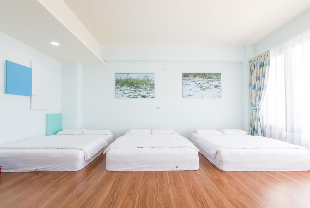Postel nebo postele na pokoji v ubytování 5+1 Homestay