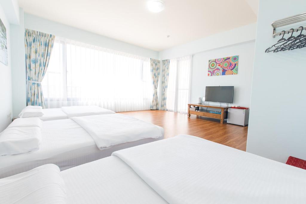 Postel nebo postele na pokoji v ubytování 5+1 Homestay