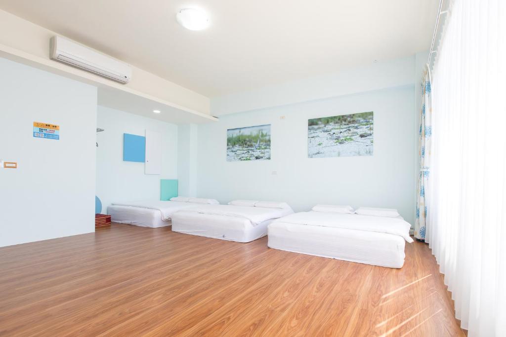 Postel nebo postele na pokoji v ubytování 5+1 Homestay
