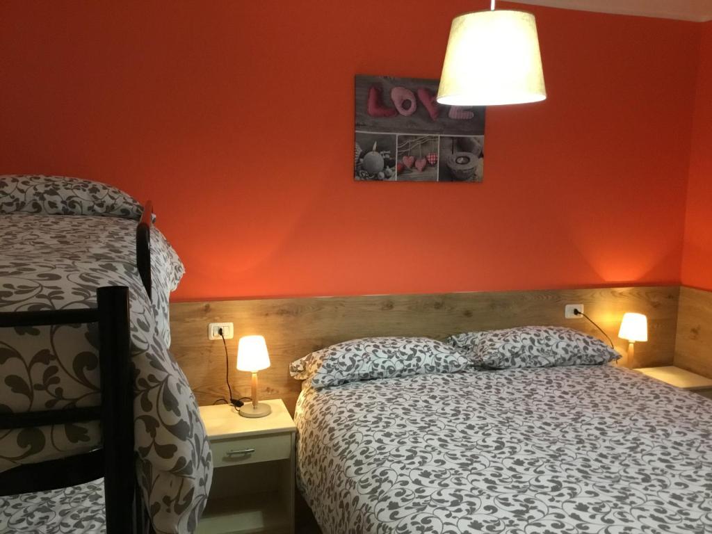 Ein Bett oder Betten in einem Zimmer der Unterkunft Home Iseo Lake