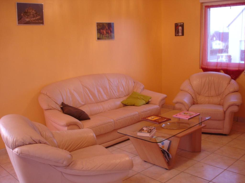Posezení v ubytování Gîte Argouges