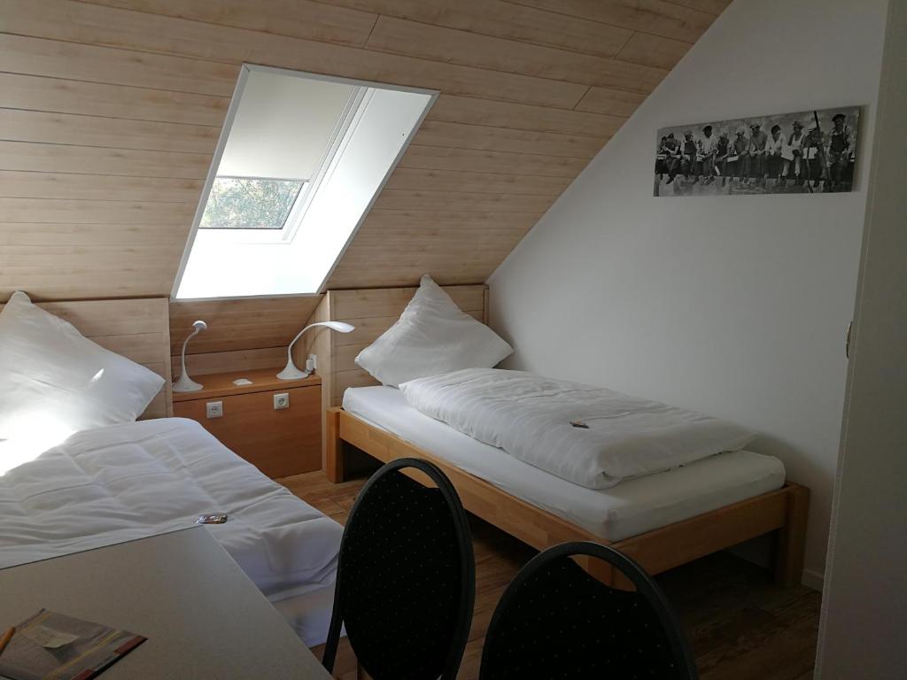 Postel nebo postele na pokoji v ubytování Apartmenthaus in Walle