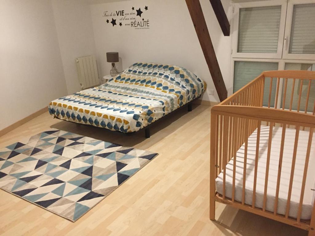 Postel nebo postele na pokoji v ubytování Gîtes d'Olbiche