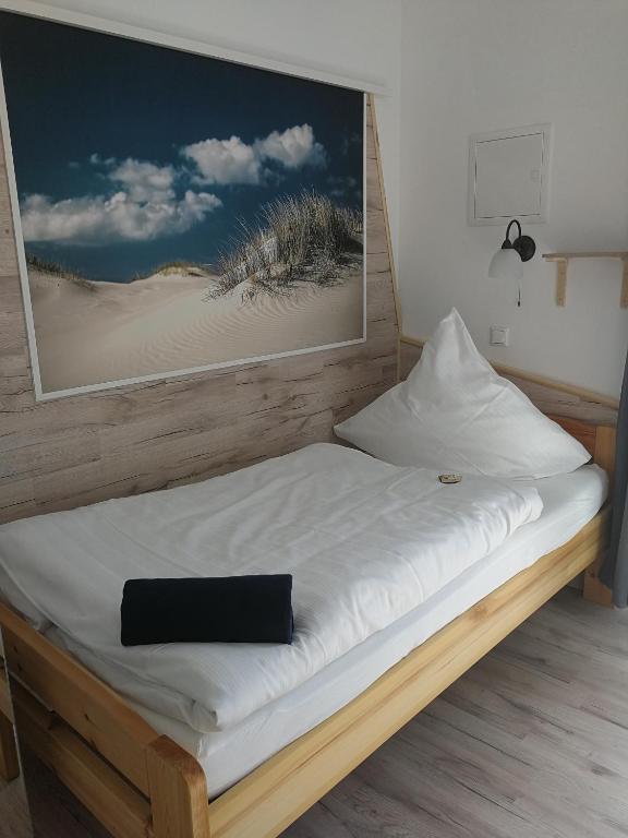Postel nebo postele na pokoji v ubytování Apartmenthaus in Walle