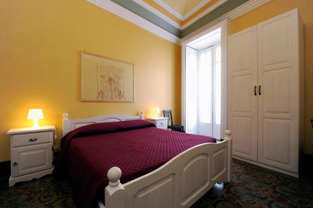 A bed or beds in a room at B&B Porta della Terra