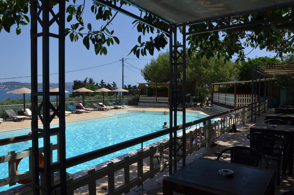 a view of a swimming pool from a resort at Apolafsi in Lixouri