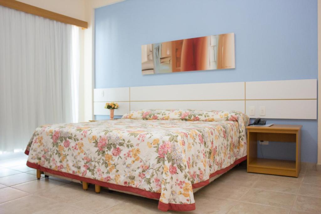 En eller flere senge i et værelse på Pousada Barlavento