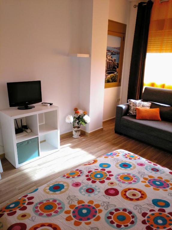 Telewizja i/lub zestaw kina domowego w obiekcie Apartamento Domingo Lozano