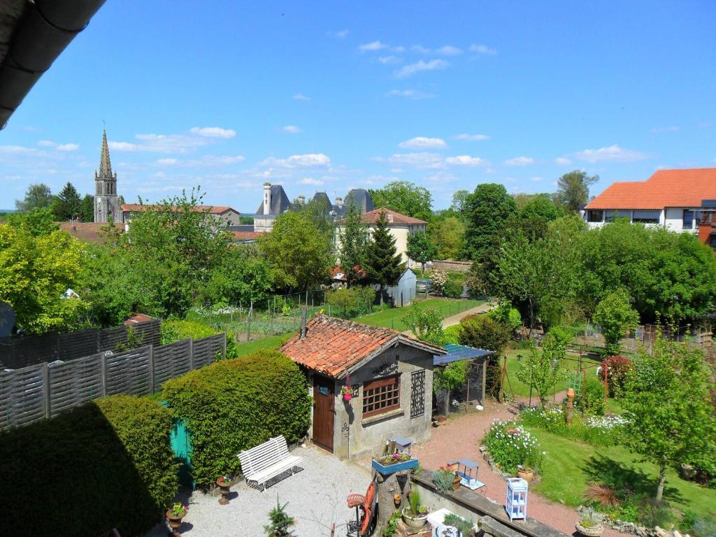 an aerial view of a garden with a small house at Chambres d&#39;Hôtes Bienvenue in LʼAbsie