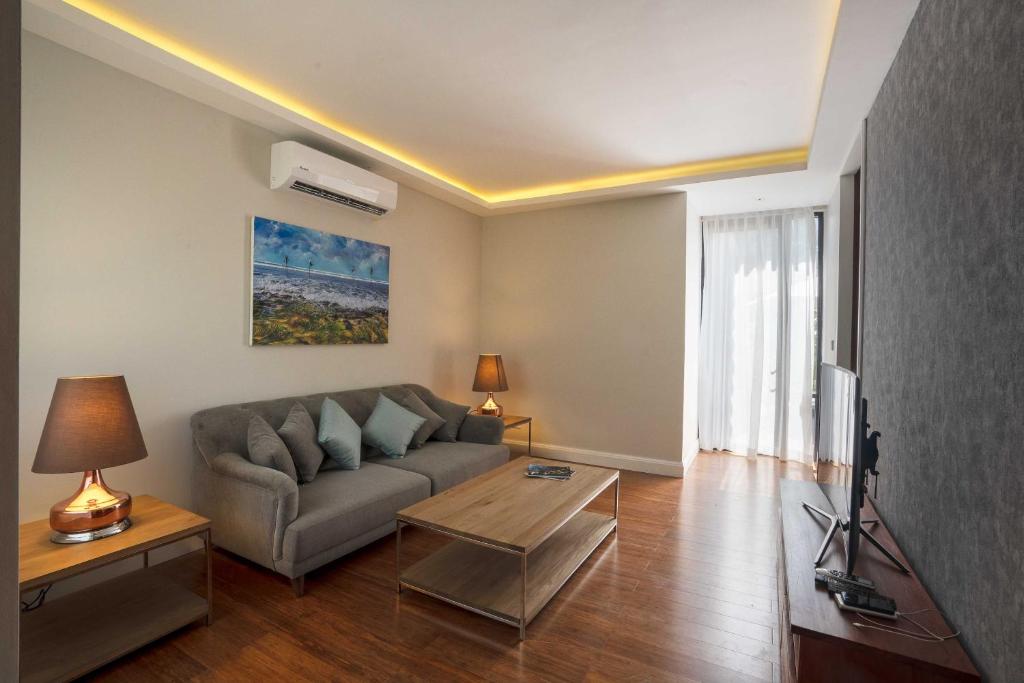 Posezení v ubytování Aprota Villas Arugambay