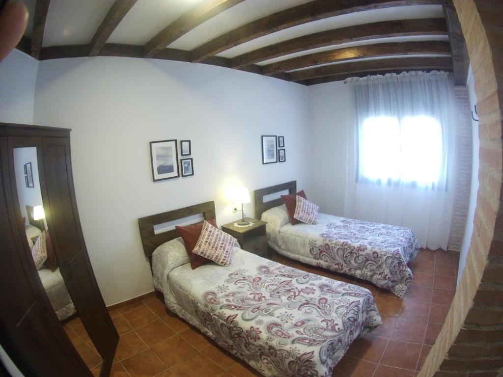 Posteľ alebo postele v izbe v ubytovaní Apartamento los arcos