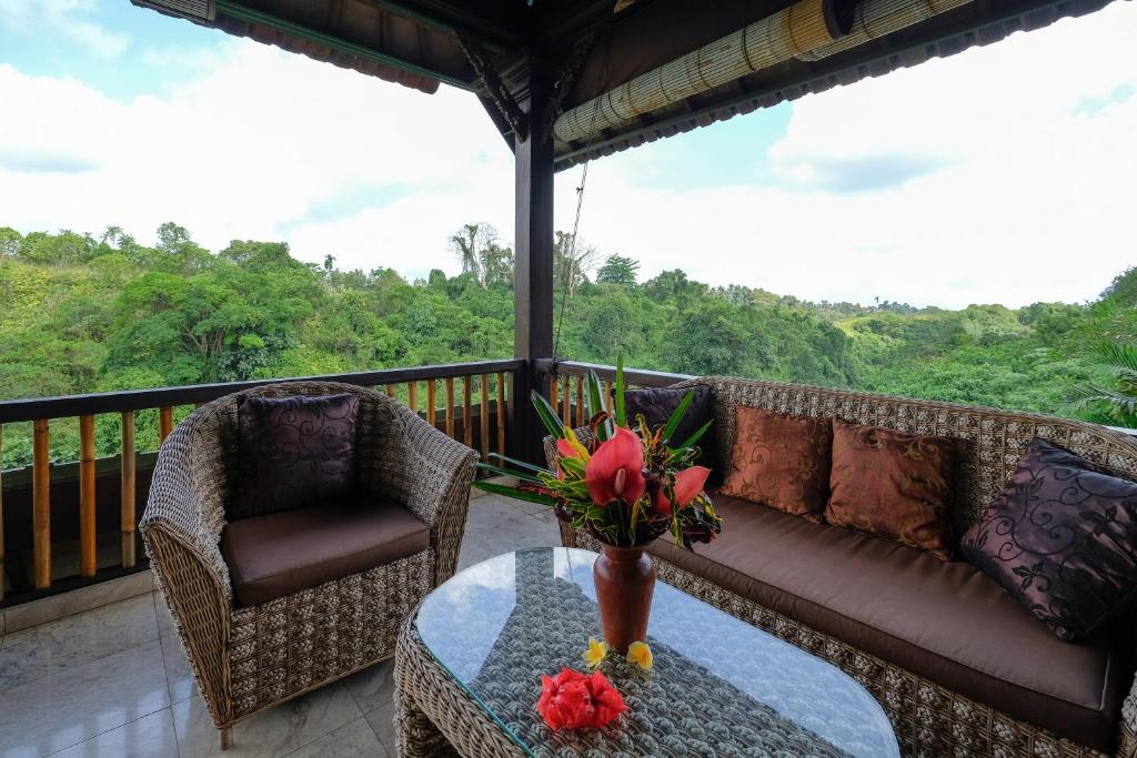 Balkón nebo terasa v ubytování Sunrise Villa Ubud