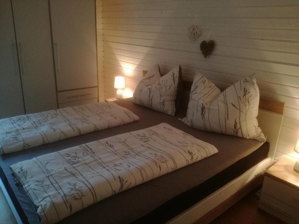 Postel nebo postele na pokoji v ubytování Haus Manfred