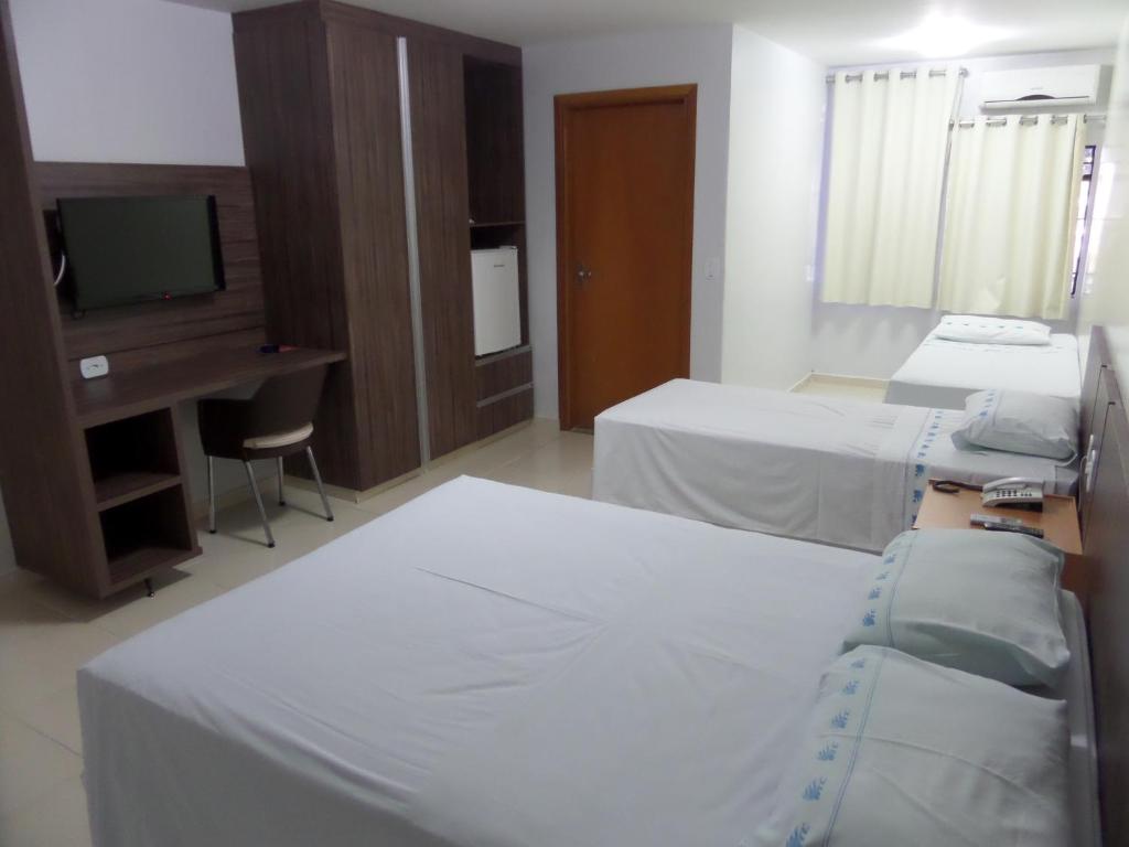 Cama ou camas em um quarto em Hotel CTC