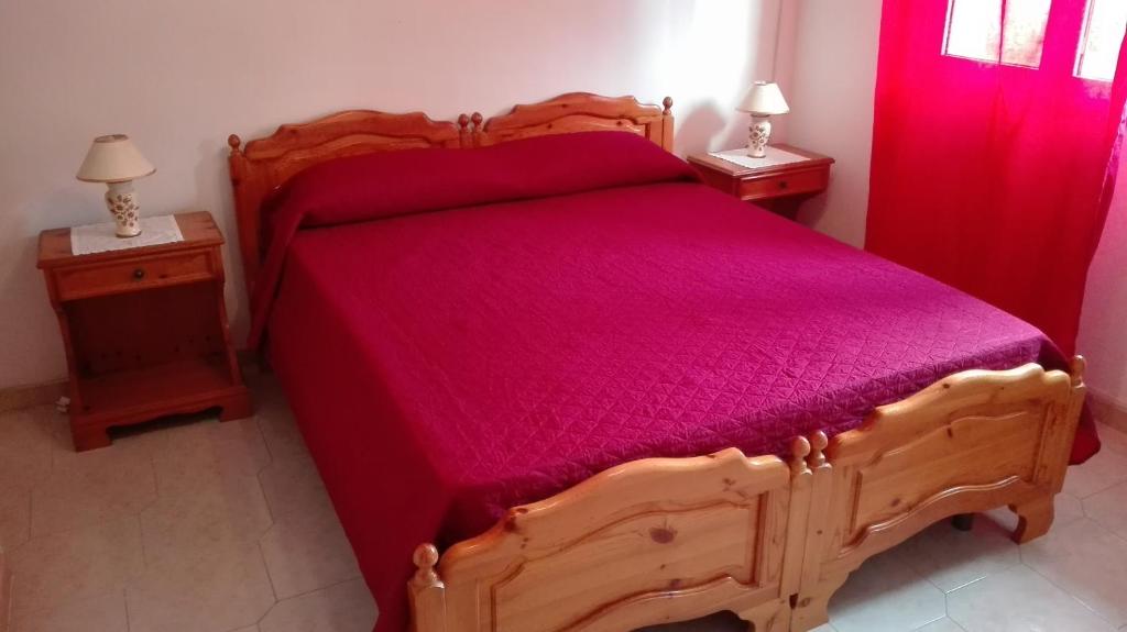 Postel nebo postele na pokoji v ubytování Kali Nitta Salento