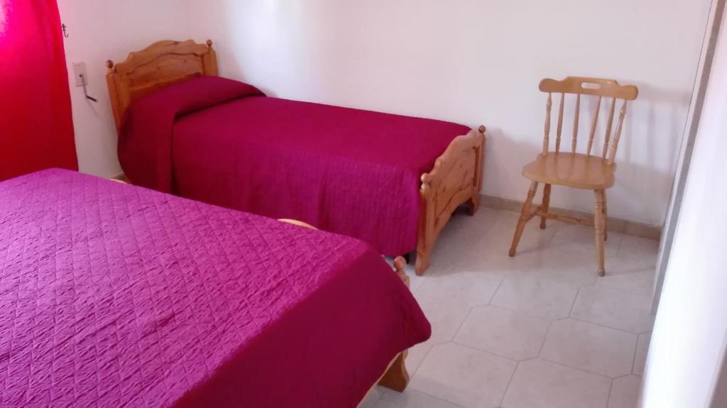 Postel nebo postele na pokoji v ubytování Kali Nitta Salento